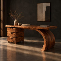 Wood desk with three stacked drawers and one sweeping curved leg, three-quarter view showing the grain