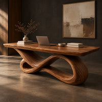 Corner detail of wooden desk with a smooth slab top on a twisting infinity loop base beside wood, brass and linen samples