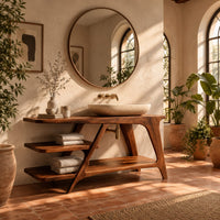 Freestanding vanity with a diagonal brace and two open tiered shelves in a bright bathroom with arched windows and plants