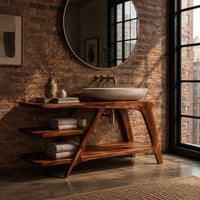 Freestanding vanity with a diagonal brace and two open tiered shelves in an industrial loft bathroom with exposed brick