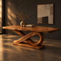 Rectangular dining table with a thick plank top on a sculpted loop base, three-quarter view showing the grain