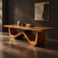 Dining table with a thick plank top on one sculpted wave base, three-quarter view showing the grain