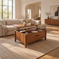 Rectangular lift top coffee table with divided compartments and tapered legs in a bright open plan living room