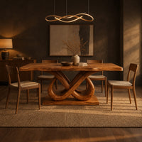 Dining table with a wavy edged slab top and a double infinity loop base in a dark dining room at golden hour