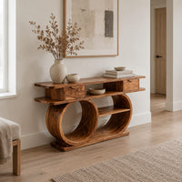 Console table with a double loop base and two small drawers in a Scandinavian entryway with white walls