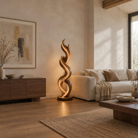 Twisting double ribbon floor lamp with a warm glow in a bright open plan living room