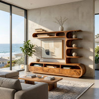 Drawer TV console with a column of curled shelves in a sunlit room with large windows and plants
