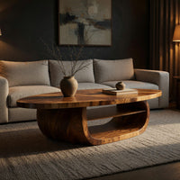 Oval coffee table on a drum base with an open shelf in a living room at golden hour