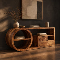 Console table with a drum shaped shelf end, two drawers and an open cubby, three-quarter view showing the grain