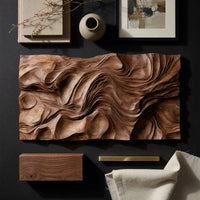 Detail of rectangular dune textured wood wall relief beside wood, brass and linen samples