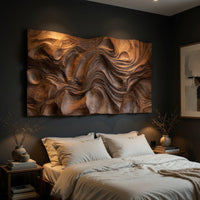 Rectangular dune textured wood wall relief above a bed in a dusk lit bedroom
