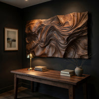 Rectangular dune textured wood wall relief above a desk in a dark study corner