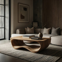 Curved side coffee table with a wave tunnel in a concrete and timber loft