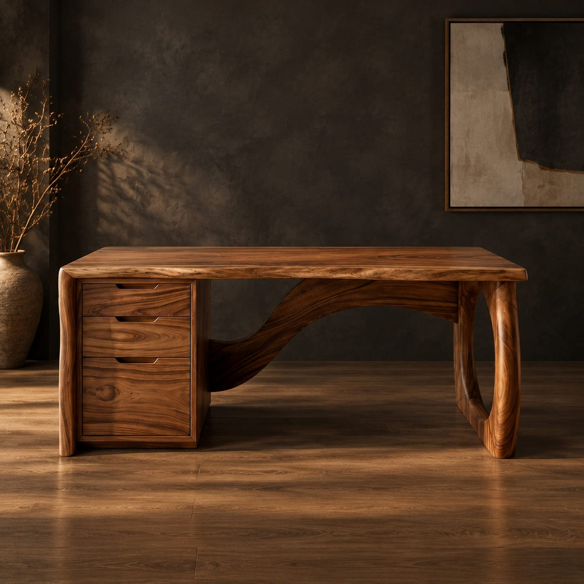 Executive desk with oval ring leg and curved back panel in a dark studio against a charcoal plaster wall