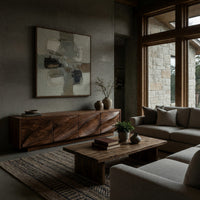 TV cabinet with four faceted sculpted doors in a concrete and timber loft