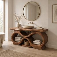 Freestanding bathroom vanity with a figure eight base and slab top in a Scandinavian bathroom with white walls