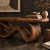 Corner detail of bench with a smooth flat seat on a figure eight loop base beside wood, brass and linen samples