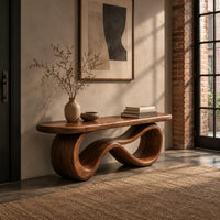 Bench with a smooth flat seat on a figure eight loop base in an industrial loft entryway with exposed brick