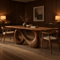 Dining table on a single figure eight loop base with two open holes in an evening dining room with walnut wall paneling