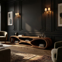 Low loop TV stand with carved figure eight openings in a living room at golden hour