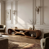 Low loop TV stand with carved figure eight openings in an open plan space in daylight