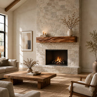 Thick mantel beam with a carved wave pattern along the front in a bright open plan living room
