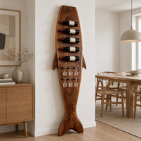 Tall fish shaped wine rack with angled bottle slots and stemware slots in a Scandinavian dining room with white walls