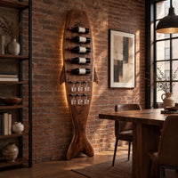 Tall fish shaped wine rack with angled bottle slots and stemware slots in an industrial loft dining room with exposed brick