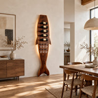 Tall fish shaped wine rack with angled bottle slots and stemware slots in a bright open plan dining room