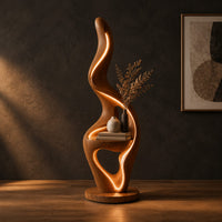 Flame shaped floor lamp with a glowing edge and a small shelf in a dark studio against a charcoal plaster wall