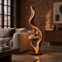 Flame shaped floor lamp with a glowing edge and a small shelf in an industrial loft living room with exposed brick