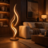 Tall flame shaped floor lamp with layered wooden ribbons on a disc base in an evening living room with walnut wall paneling