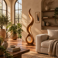 Flame shaped floor lamp with an open loop base and inner glow in a bright living room with arched windows and plants