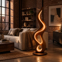 Flame shaped wooden lamp with open loops and a glowing edge line in an industrial loft living room with exposed brick