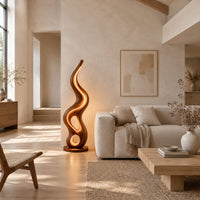Flame shaped wooden lamp with open loops and a glowing edge line in a bright open plan living room