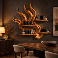 Flame shaped wine rack with tall carved tongues and staggered plank shelves in a dark dining room at golden hour