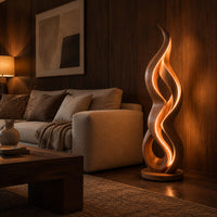 Floor lamp shaped like a twisting flame on a flat disc base in an evening living room with walnut wall paneling