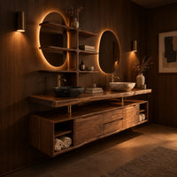Floating bathroom vanity cabinet with a slab top and a branching shelf tower in an evening bathroom with walnut wall paneling