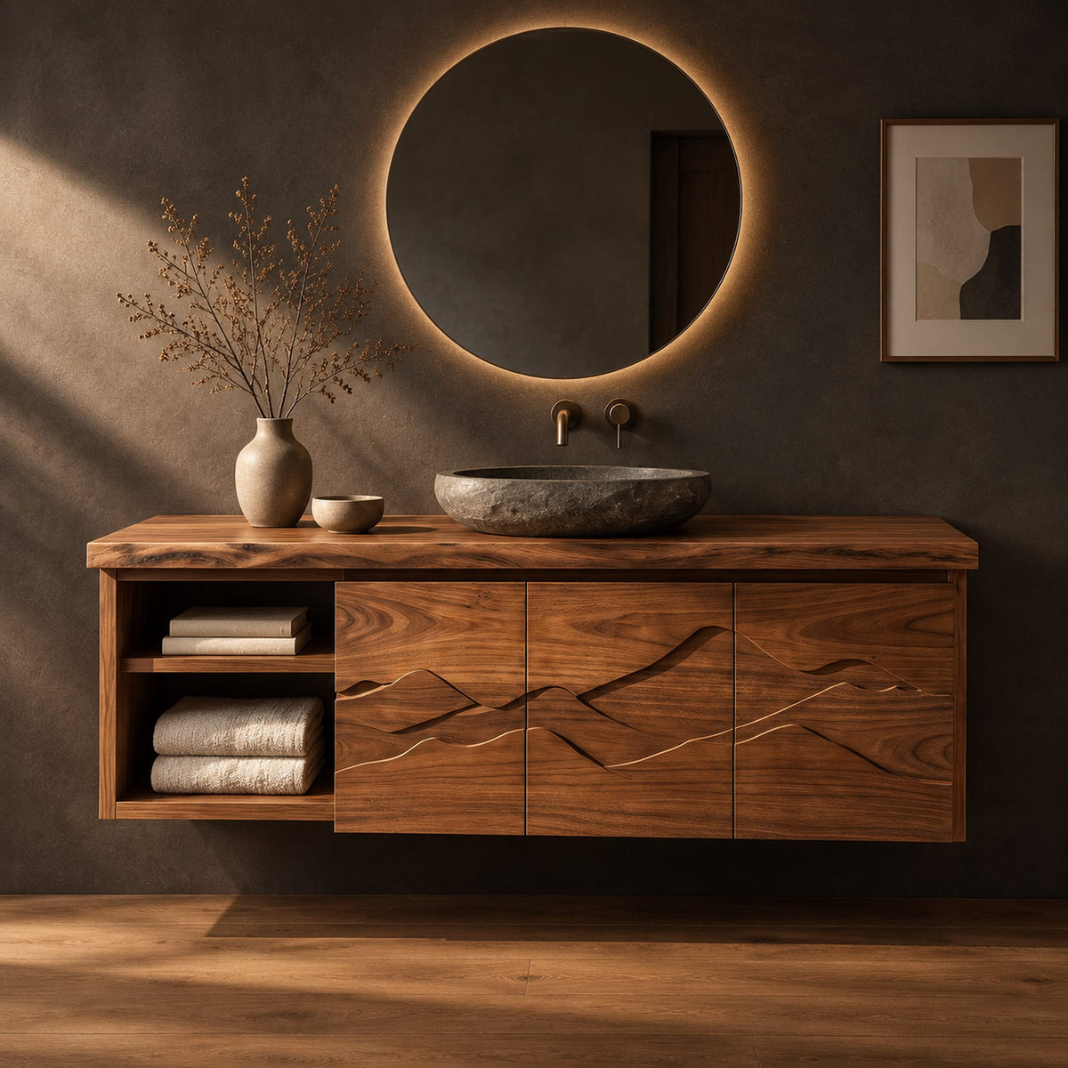 Floating wooden vanity cabinet with carved ridge line fronts and open end shelves in a dark studio against a charcoal plaster wall