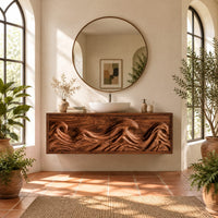 Floating bathroom vanity with deeply carved ocean wave doors in a bright bathroom with arched windows and plants
