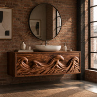 Floating bathroom vanity with deeply carved ocean wave doors in an industrial loft bathroom with exposed brick