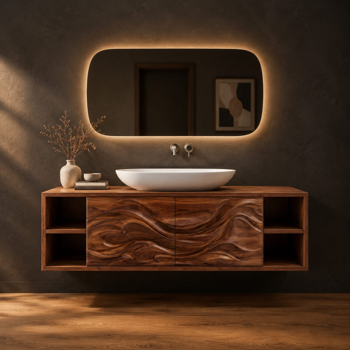Floating bathroom vanity with carved wave doors and open end shelves in a dark studio against a charcoal plaster wall