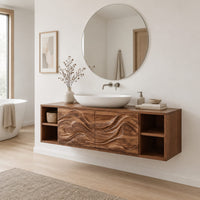 Floating bathroom vanity with carved wave doors and open end shelves in a Scandinavian bathroom with white walls