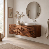 Floating bathroom vanity with wave carved drawer fronts in a Scandinavian bathroom with white walls