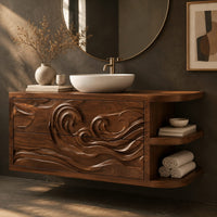 Corner detail of floating cabinet with carved swirling wave front and open side shelves beside wood, brass and linen samples