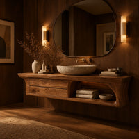Floating wooden vanity cabinet with flared ends and an open shelf in an evening bathroom with walnut wall paneling