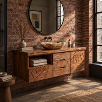 Floating wooden vanity cabinet with leaf and wave carved fronts and an open niche in an industrial loft bathroom with exposed brick