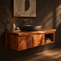 Floating wooden vanity cabinet with a live edge top and open side niche, three-quarter view showing the grain