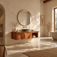 Floating wooden vanity cabinet with a live edge top and open side niche in a bright open plan bathroom