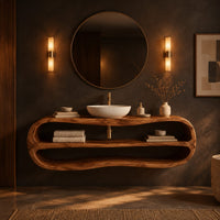 Floating oval vanity cabinet with a looping rim and two open shelves in a dark bathroom at golden hour